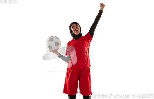 Image of Arabian female soccer or football player isolated on white studio background