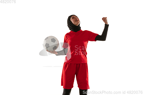 Image of Arabian female soccer or football player isolated on white studio background