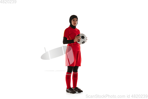 Image of Arabian female soccer or football player isolated on white studio background