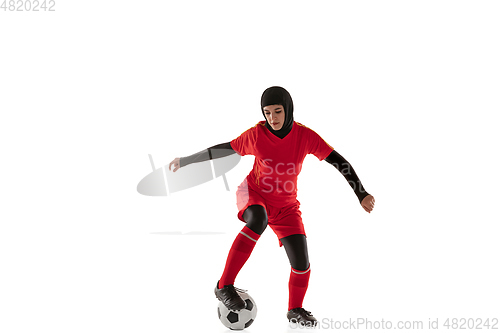 Image of Arabian female soccer or football player isolated on white studio background