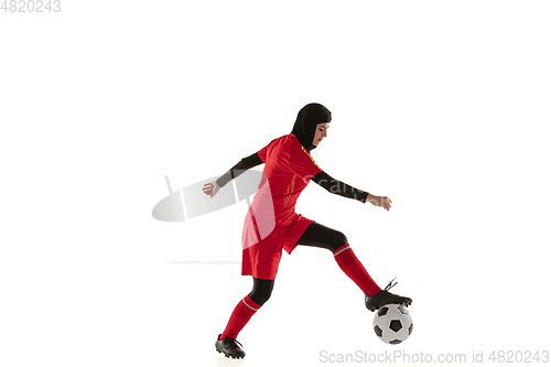 Image of Arabian female soccer or football player isolated on white studio background