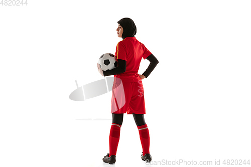 Image of Arabian female soccer or football player isolated on white studio background