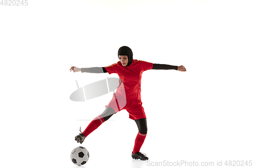 Image of Arabian female soccer or football player isolated on white studio background