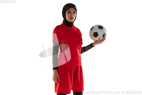 Image of Arabian female soccer or football player isolated on white studio background