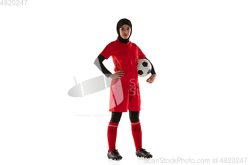 Image of Arabian female soccer or football player isolated on white studio background