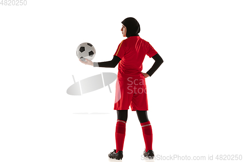 Image of Arabian female soccer or football player isolated on white studio background