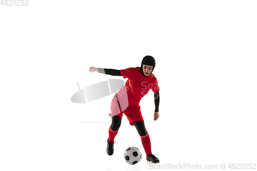 Image of Arabian female soccer or football player isolated on white studio background