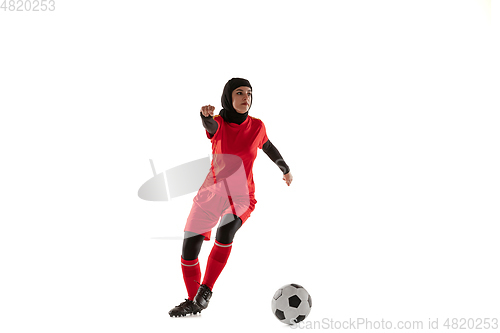 Image of Arabian female soccer or football player isolated on white studio background