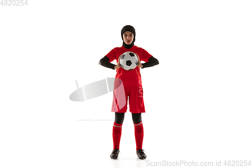 Image of Arabian female soccer or football player isolated on white studio background