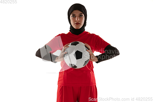 Image of Arabian female soccer or football player isolated on white studio background