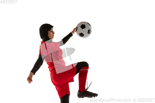 Image of Arabian female soccer or football player isolated on white studio background