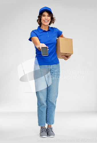 Image of delivery woman with smartphone and parcel box