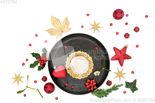 Image of Christmas Mince Pie with Winter Greenery and Baubles   