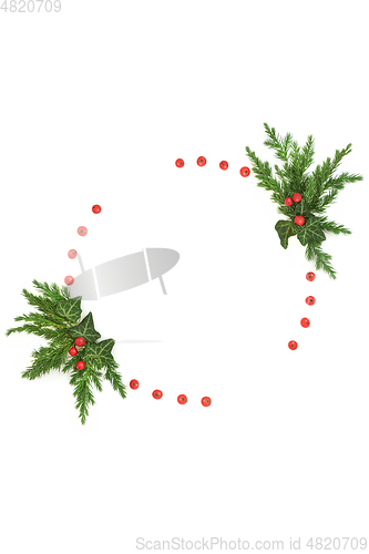 Image of Abstract Christmas Wreath with Fir and Holly Berries  