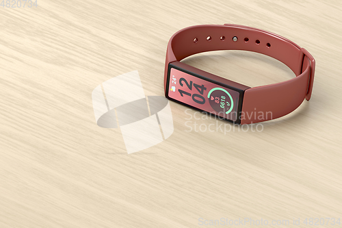 Image of Smartwatch on wooden table