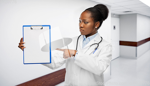 Image of african american female doctor with clipboard