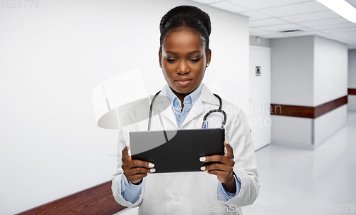 Image of african american female doctor with tablet pc