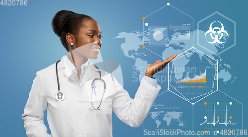 Image of african american doctor over world pandemia map