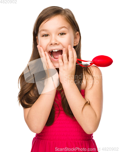 Image of Portrait of a little girl in red