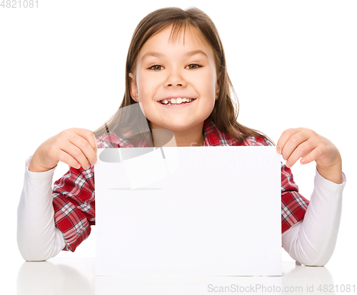 Image of Little girl is looking from out blank board