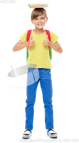 Image of Portrait of a cute little schoolgirl with backpack