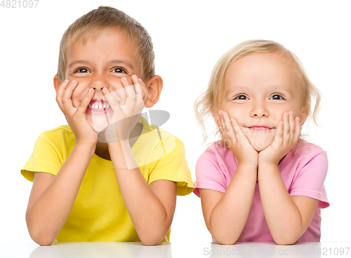 Image of Portrait of a cute little girl and boy