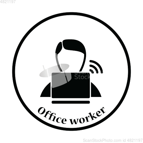 Image of Businessman sitting behind a laptop icon