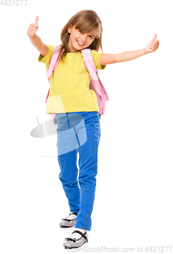 Image of Little schoolgirl with a backpack