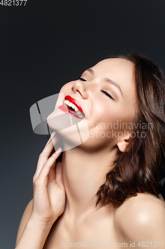 Image of beautiful girl with red lips