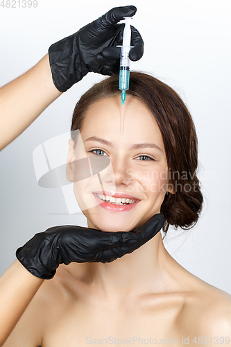 Image of girl getting beauty injection