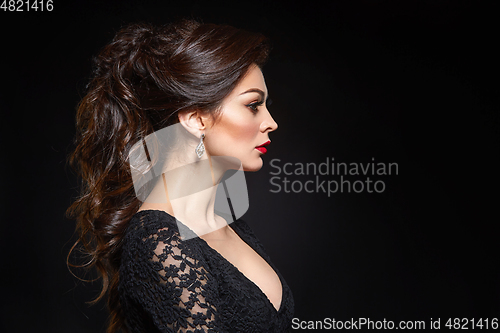 Image of beautiful young woman with red lips