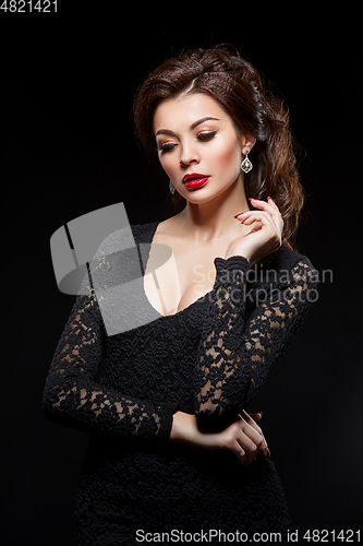 Image of beautiful young woman with red lips