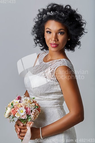 Image of beautiful bride with bouquet