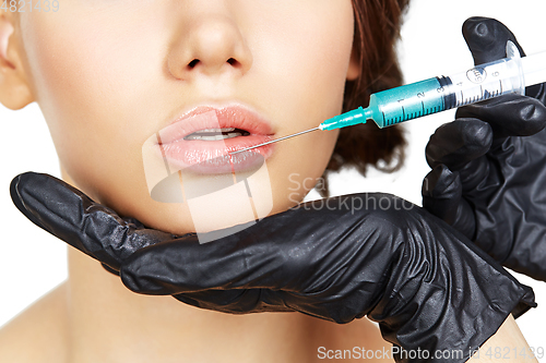 Image of girl getting beauty injection