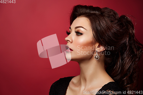 Image of beautiful young woman with red lips