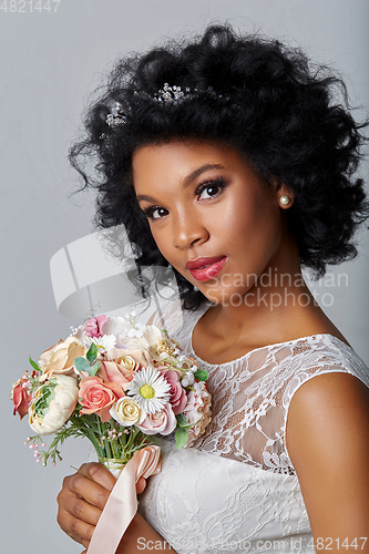 Image of beautiful bride with bouquet