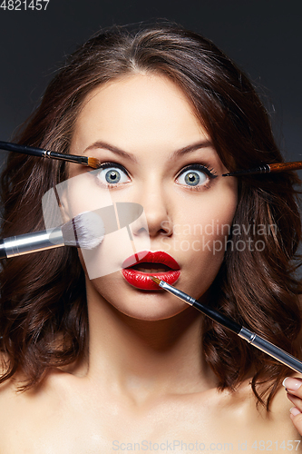 Image of beautiful girl with red lips