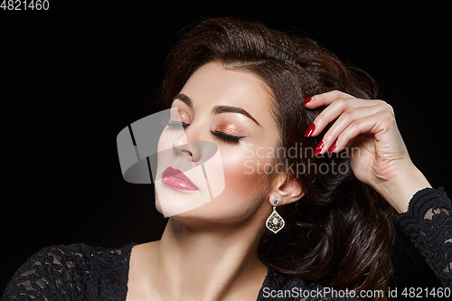 Image of beautiful young woman with red lips