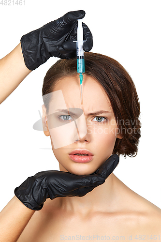 Image of girl getting beauty injection