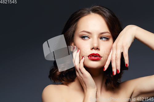 Image of beautiful girl with red lips