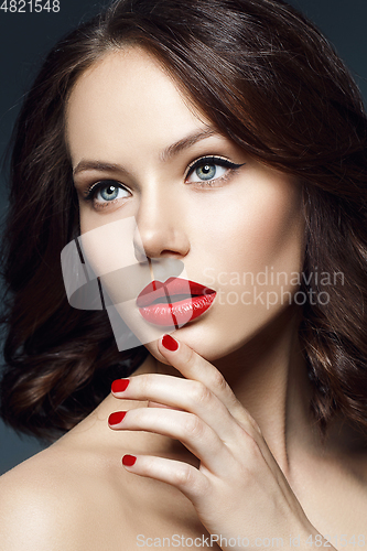Image of beautiful girl with red lips