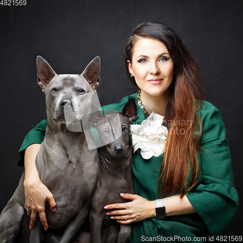 Image of woman with two dogs