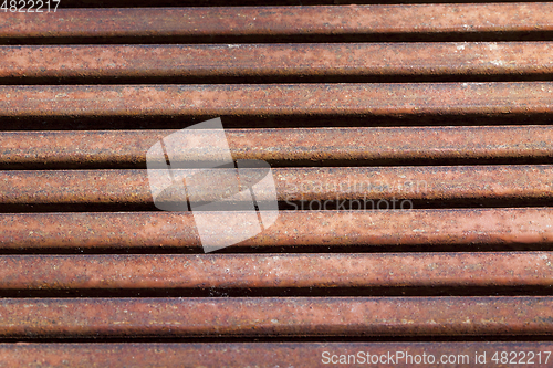 Image of old rusty metal grate