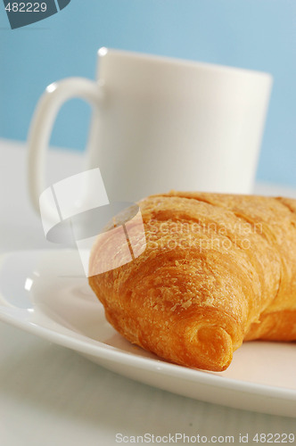 Image of Cocoa and croissant