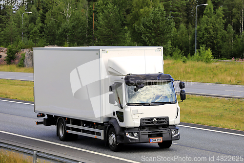 Image of White Renault Truck Delivers Goods 