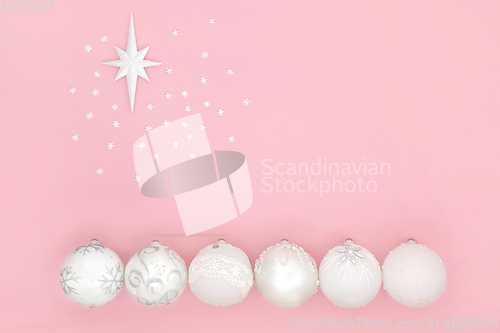 Image of Abstract Christmas White Baubles on Pink Background