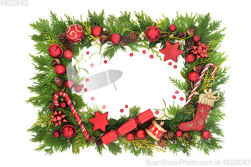 Image of Christmas Background with Baubles Greenery and Holly Berries 