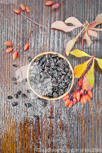 Image of Barberry dried in bowl on dark board top