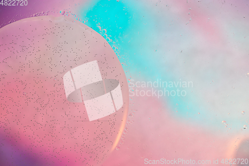 Image of Defocused pastel colored abstract background picture made with oil, water and soap