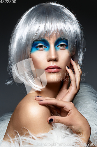 Image of girl in silver wig with blue makeup